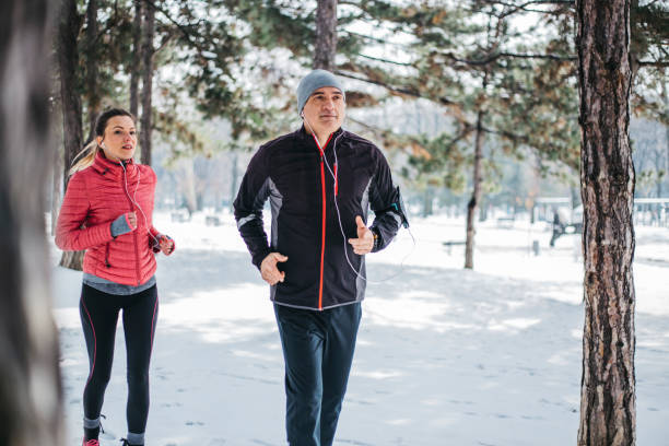 istock Running outdoors in a park - couple 1087129568