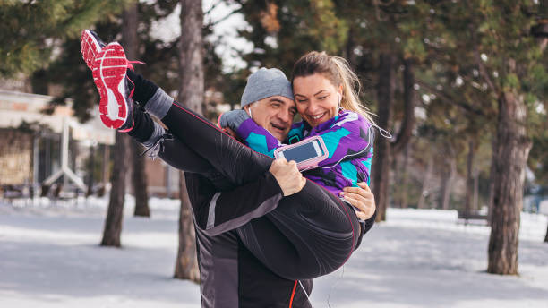Running outdoors in a park - couple