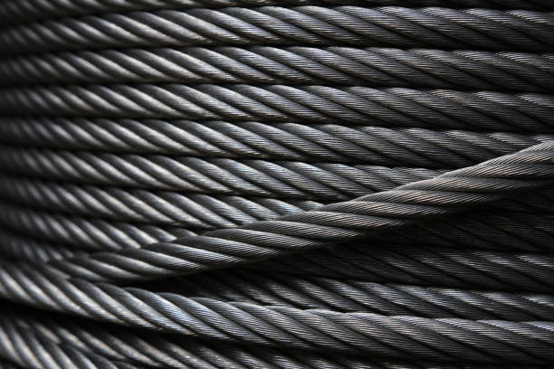 Steel Cable Background Closeup of heavy duty new steel cable. steel wire or steel sling.Texture and background steel cable photos stock pictures, royalty-free photos & images