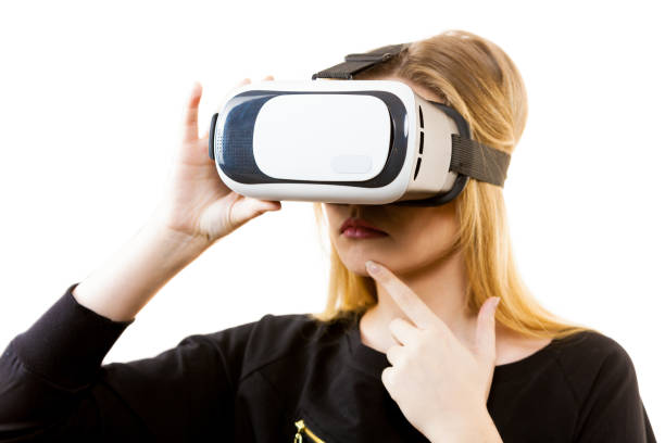 istock Woman wearing VR goggles 1087139868