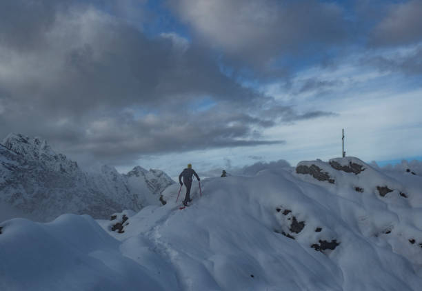 istock Lone climber on a snowy ridge 1087141840