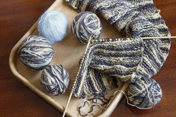 istock Balls of wool and knitting  needles 1087149972