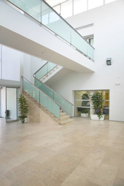 istock Modern building interior with staircase and walkway. Architecture 1087154332