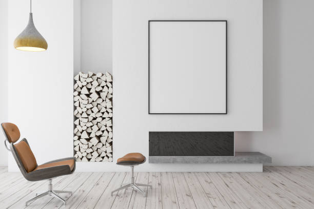 istock White fireplace with brown armchair, poster 1087155920