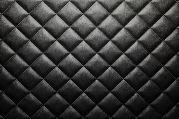 Black patterned leather background or texture stock photo