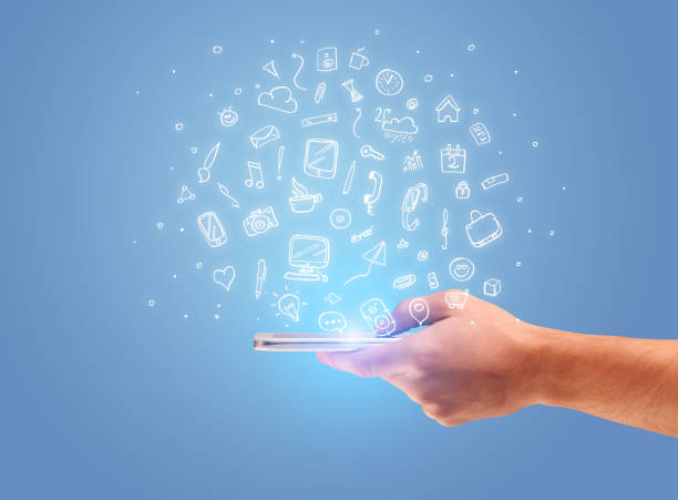 istock Hand with phone and drawn office icons 1087163388