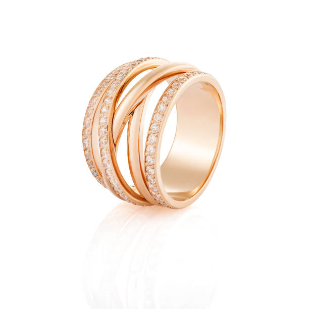 istock Pink gold ring with diamonds isolated on white background 1087163472