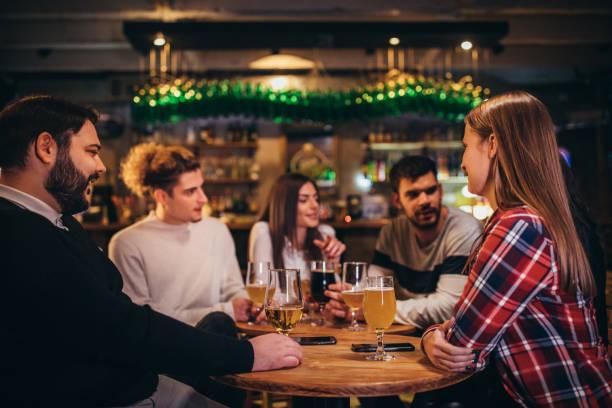 istock Friends sitting in bar 1087163560