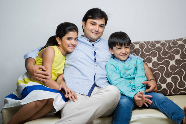 istock Father With Kids - stock Images 1087167502
