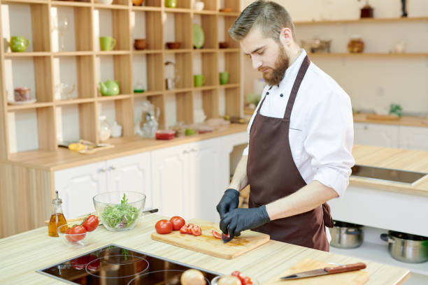istock Professional Chef Cooking Salad  in Restaurant 1087167660