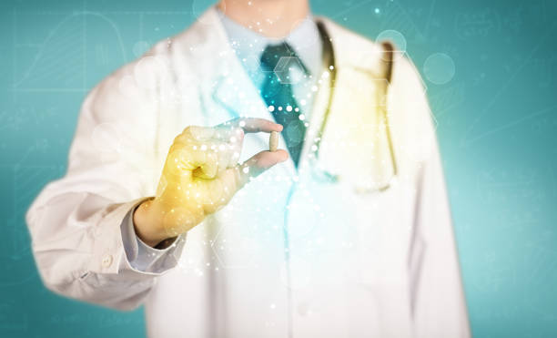 istock A doctor in tie holding a pill 1087169592