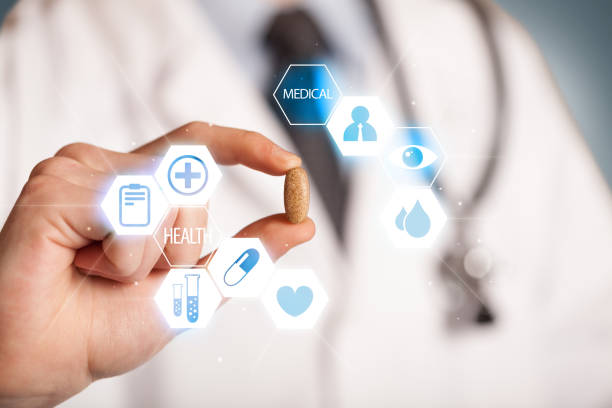 istock A doctor in white holding a pill 1087169736