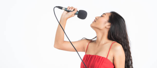 istock Beautiful woman singing and dancing. 1087171876