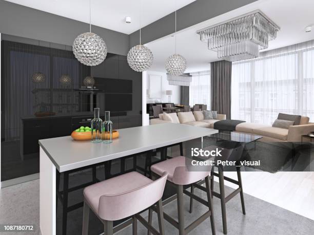 Modern Kitchen With An Island And Bar Stools With Builtin Appliances Stock Photo - Download Image Now