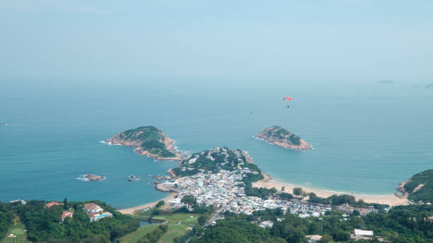 istock Paragliding Over Shek-O Peninsula 1087181144