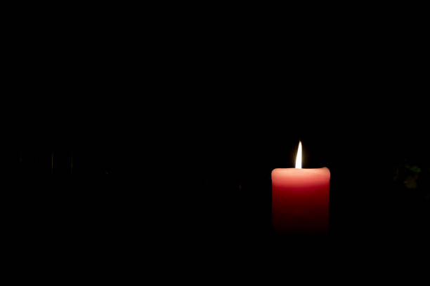 istock A red candle in the church. 1087187812