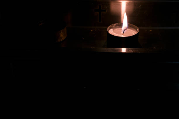 istock Metal candlestick with candle. 1087188604