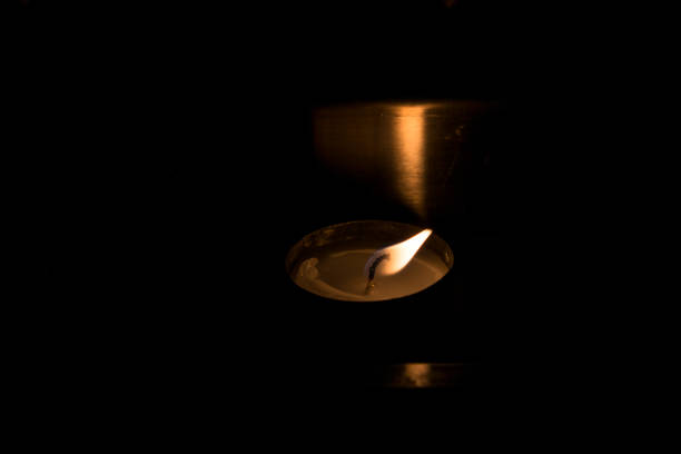 istock Metal candlestick with candle. 1087188792