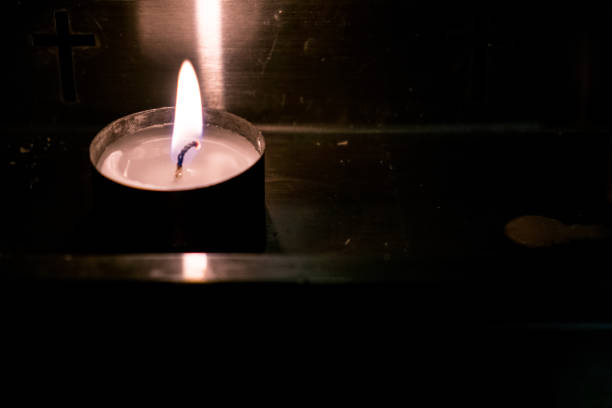 istock Metal candlestick with candle. 1087189064