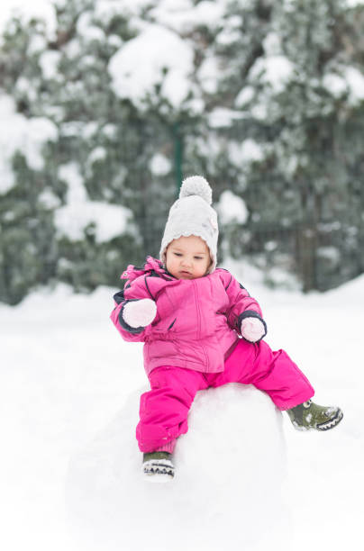 istock Baby girl enjoying snow! 1087189068