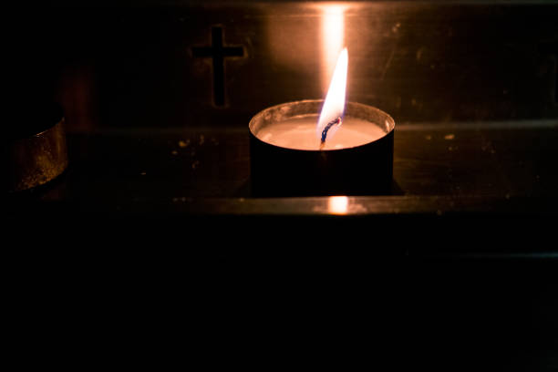 istock Metal candlestick with candle. 1087189280