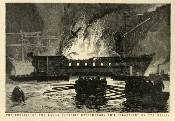 Burning ship on the river Mersey, Victorian 19th Century Vintage engraving of Burning ship on the river Mersey.  The Roman Catholic reformatory ship Clarence. The Graphic 1884. HMS Clarence was an 84-gun second rate ship of the line of the Royal Navy. She was lent to the Liverpool Catholic Reformatory Association for use as a boys reformatory ship and was destroyed by a fire set by 6 of the boys whilst at her mooring in the Mersey river mersey northwest england stock illustrations