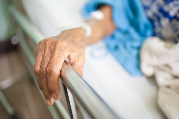 istock Elderly Handle on bed with bedroom safety patient 1087202528