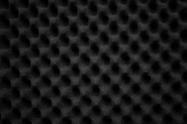 istock Texture soundproof panel of polyurethane foam. Abstract black rubber foam background. 1087204568