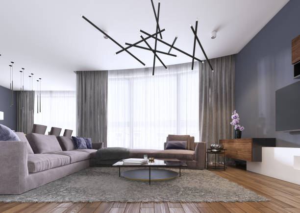 istock Chic living room filled with built-in cabinets, violet corner sofa, soft sofa facing two low tables and window wall. Contemporary style. 1087207450