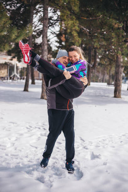 istock Running outdoors in a park - couple 1087209472