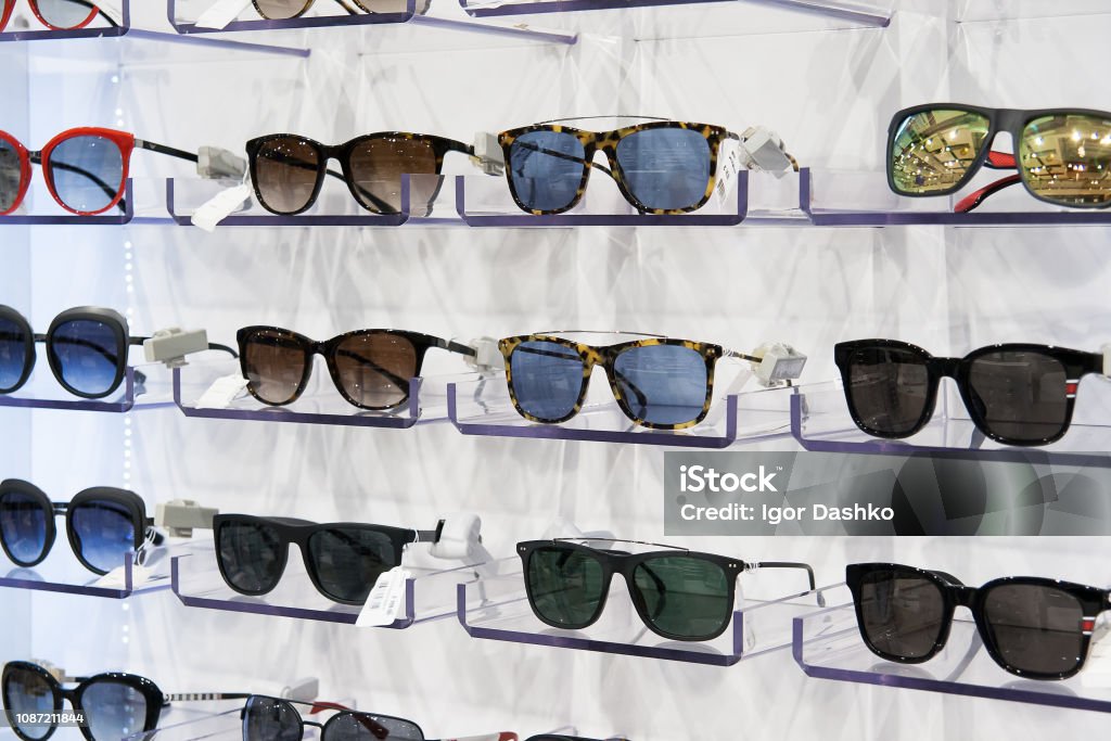 Sunglasses for sale, placed on the shelves Sunglasses for sale, placed on the shelves, horizontal formation Sunglasses Stock Photo