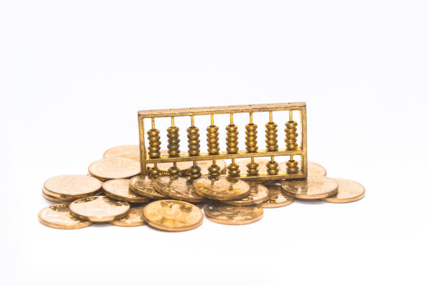 The gold abacus is placed on gold COINS