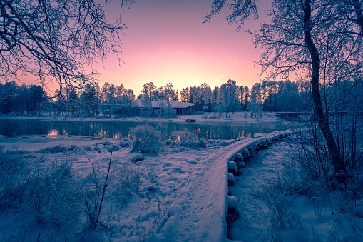 Snowy river view from Kuhmo, Finland.