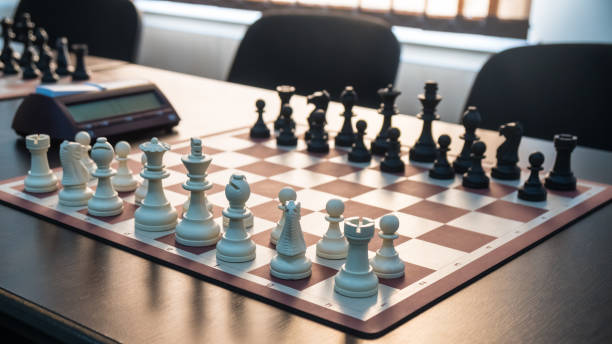 istock chess pieces on the table before the tournament 1087214690