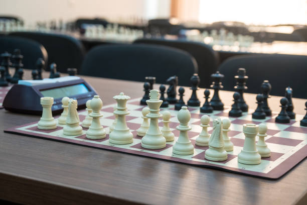 istock chess pieces on the table before the tournament 1087214704