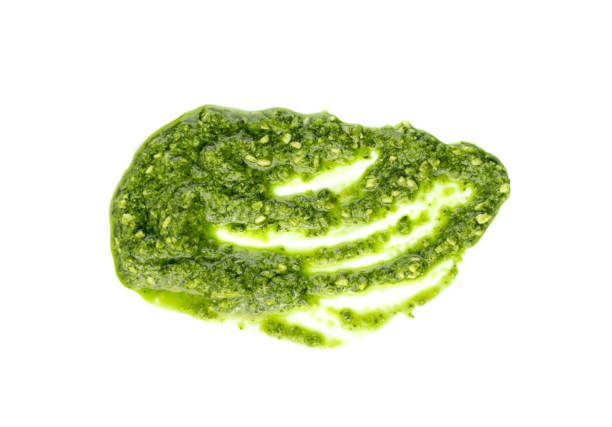istock Pesto sauce spread or blob isolated on white background 1087215020