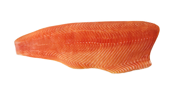Big Raw Natural Atlantic Salmon Fillet Isolated on White Background. Macro Photo Fresh Norwegian Red Fish or Trout Meat Top View