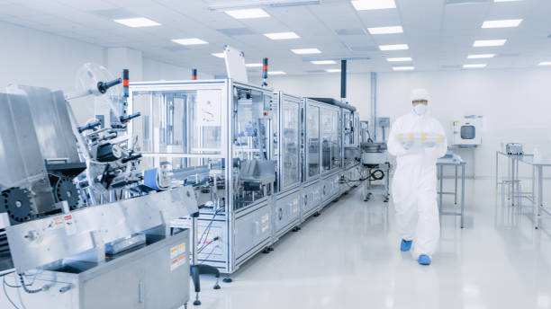 istock Shot of Sterile Pharmaceutical Manufacturing Laboratory where Scientists in Protective Coverall's Do Research, Quality Control and Work on the Discovery of new Medicine. 1087218938