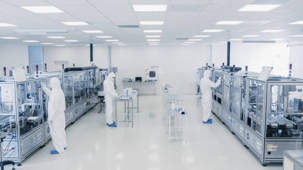 istock Shot Of Sterile Pharmaceutical Manufacturing Laboratory where Scientists in Protective Coverall's Do Research, Quality Control and Work on the Discovery of new Medicine. 1087219188