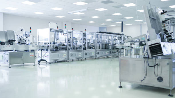 istock Shot of Sterile Precision Manufacturing Laboratory with 3D Printers, Super Computers and other Electrical Equipment and Machines suitable for Pharmaceutics, Biotechnology and Semiconductor Researches. 1087219692