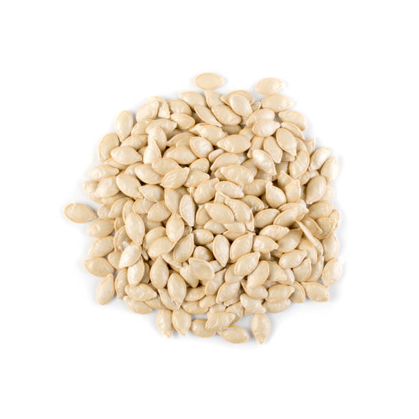 istock Squash, pumpkin or melon seeds isolated on white background 1087223778