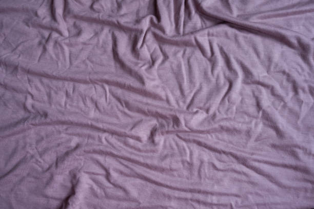 istock Pink viscose fabric in soft folds from above 1087224072