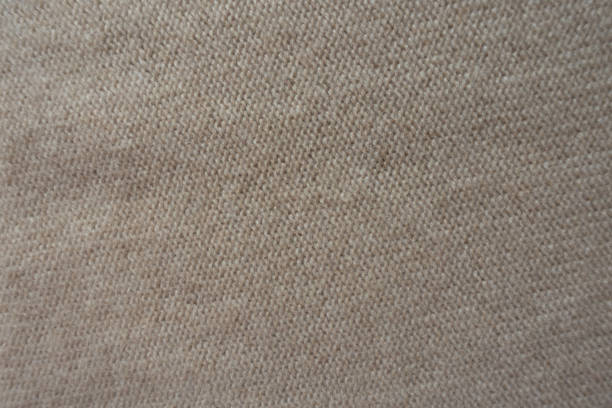 istock Back of simple knitted fabric from above 1087224130