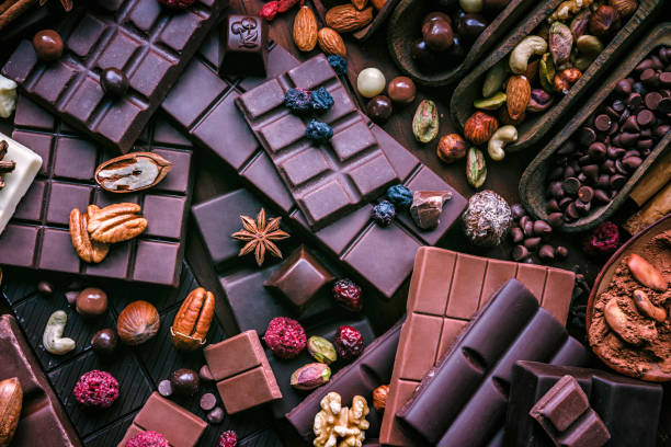 istock Assorted chocolate, nuts and dried fruit in old fashioned style 1087227060