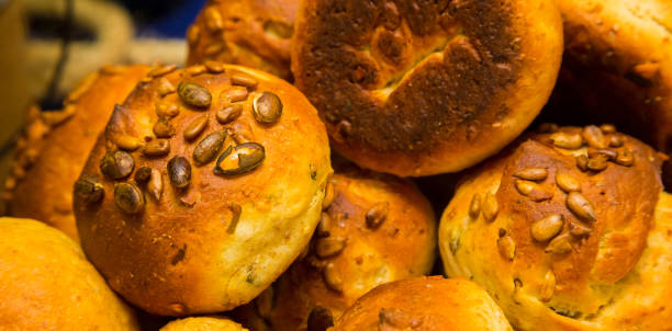 istock Whole Wheat brown bread rolls at Spring Festival picnic event 1087227374