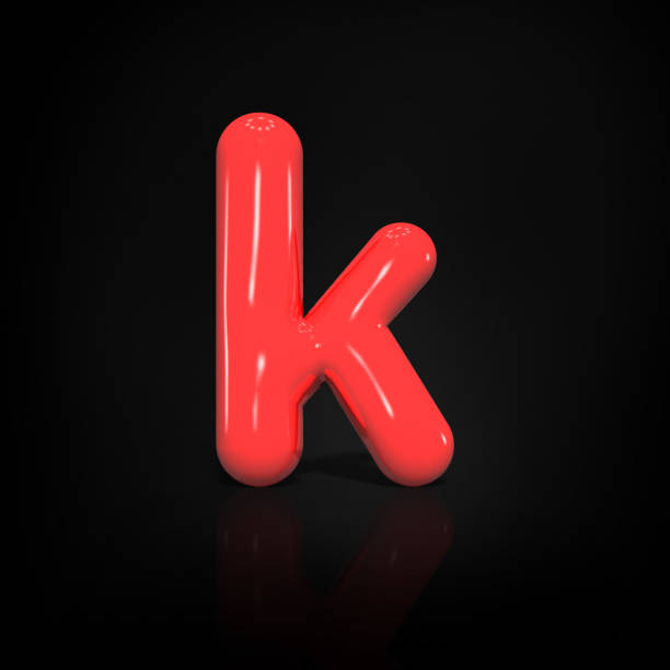 istock Glossy red paint  letter K lowercase of bubble isolated on black background, 3d rendering illustration. 1087232428