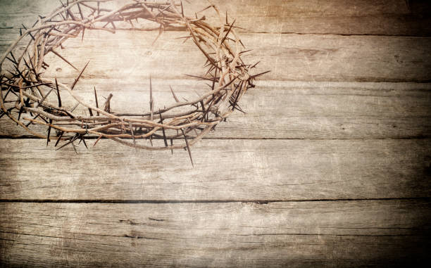 istock Easter Crown of Thorns on an Old Wood Background 1087238570