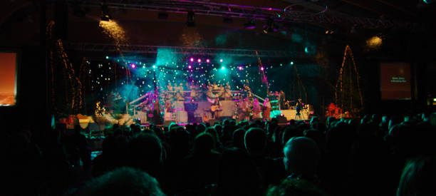 Brunssum, the Netherlands, - December 24, 2008. Youth choir in concert on Christmas Eve in the public hall of the city. Entrance is for free and the performance is decorated in Dickens style.