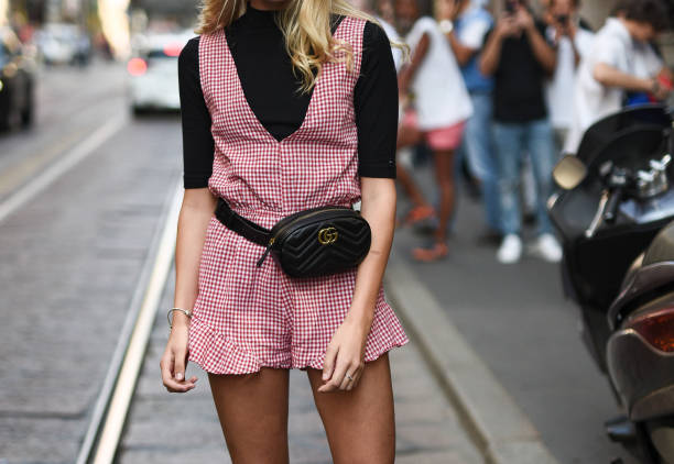 September 21, 2018: Milan, Italy - Street style outfits in detail during Milan Fashion Week  - MFWSS19 September 21, 2018: Milan, Italy - Street style outfits in detail during Milan Fashion Week  - MFWSS19 mock turtleneck stock pictures, royalty-free photos & images