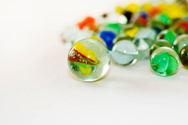 istock Vintage glass marbles on isolated white background 1087247492